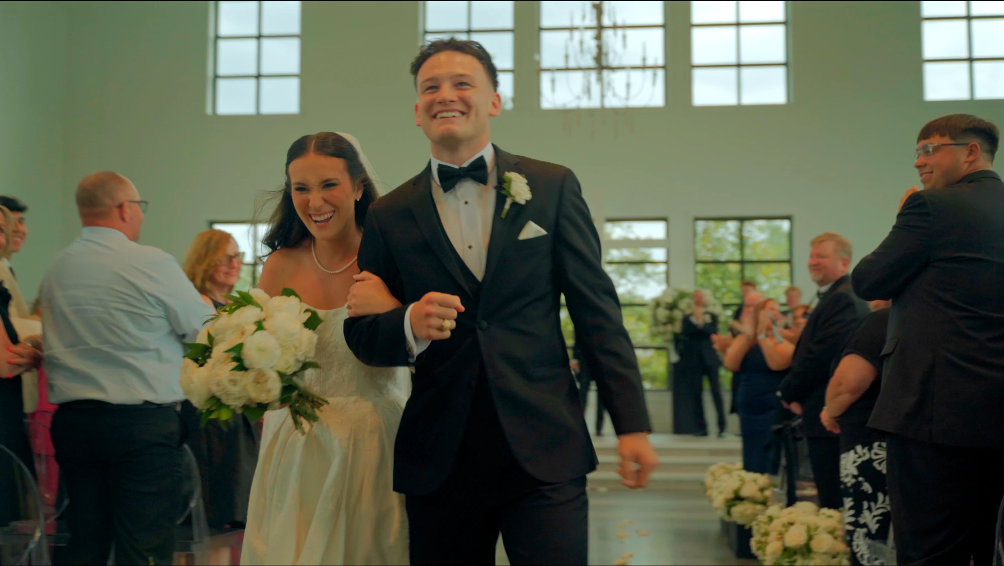 Couple walking down the aisle