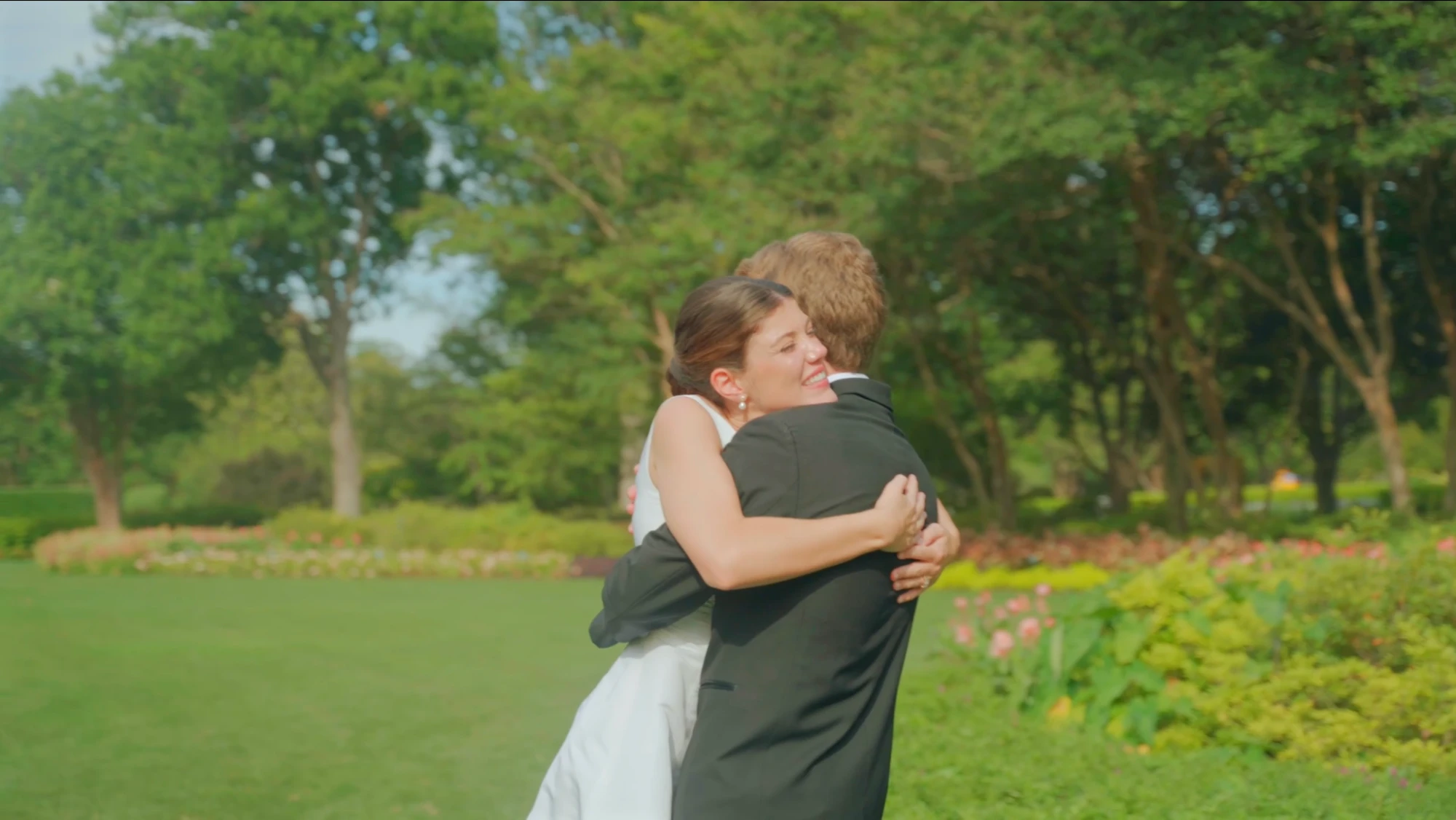 Couple embracing in a garden