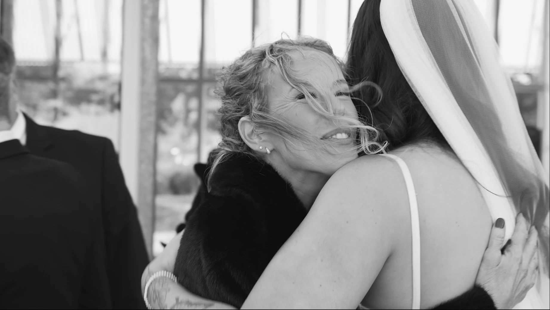 Mother and bride embracing
