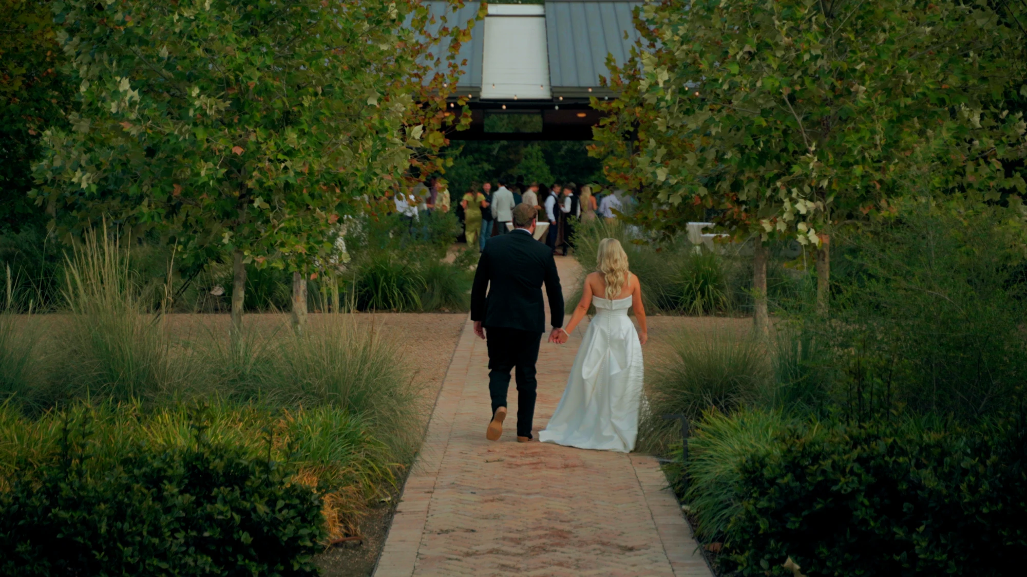 Couple walking to reception